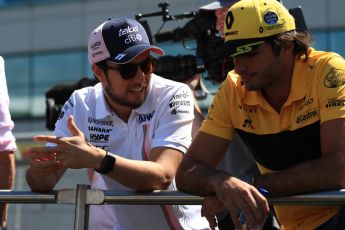 World © Octane Photographic Ltd. Formula 1 – British GP - Drivers’ Parade. Renault Sport F1 Team RS18 – Carlos Sainz and Sahara Force India VJM11 - Sergio Perez. Silverstone Circuit, Towcester, UK. Sunday 8th July 2018.