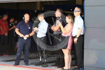 World © Octane Photographic Ltd. Formula 1 – British GP - Qualifying. Billy Monger and Mario Isola – Pirelli Head of Car Racing. Silverstone Circuit, Towcester, UK. Saturday 7th July 2018.