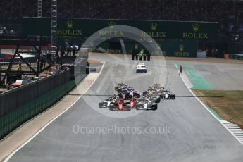 World © Octane Photographic Ltd. Formula 1 – British GP - Race. Race start Vettel's Ferrari leads Hamilton's Mercedes. Silverstone Circuit, Towcester, UK. Sunday 8th July 2018.