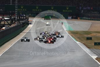 World © Octane Photographic Ltd. Formula 1 – British GP - Race. Race start Vettel's Ferrari leads Hamilton's Mercedes. Silverstone Circuit, Towcester, UK. Sunday 8th July 2018.