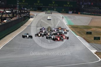 World © Octane Photographic Ltd. Formula 1 – British GP - Race. Race start Vettel's Ferrari leads Hamilton's Mercedes. Silverstone Circuit, Towcester, UK. Sunday 8th July 2018.