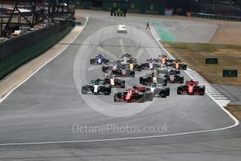 World © Octane Photographic Ltd. Formula 1 – British GP - Race. Scuderia Ferrari SF71-H – Sebastian Vettel with Valtteri Bottas coming up the inside into 2nd. Silverstone Circuit, Towcester, UK. Sunday 8th July 2018.