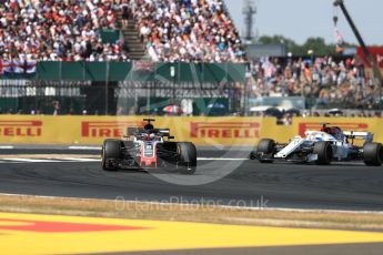 World © Octane Photographic Ltd. Formula 1 – British GP - Race. Haas F1 Team VF-18 – Romain Grosjean and Alfa Romeo Sauber F1 Team C37 – Marcus Ericsson. . Silverstone Circuit, Towcester, UK. Sunday 8th July 2018.
