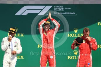 World © Octane Photographic Ltd. Formula 1 – British GP - Podium. Scuderia Ferrari SF71-H – Sebastian Vettel,
Mercedes AMG Petronas Motorsport AMG F1 W09 EQ Power+ - Lewis Hamilton and Kimi Raikkonen. Silverstone Circuit, Towcester, UK. Sunday 8th July 2018.
