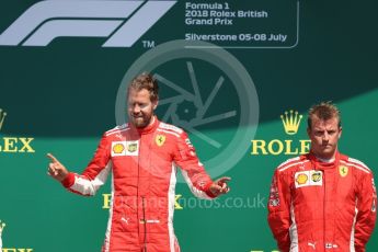 World © Octane Photographic Ltd. Formula 1 – British GP - Podium. Scuderia Ferrari SF71-H – Sebastian Vettel and Kimi Raikkonen. Silverstone Circuit, Towcester, UK. Sunday 8th July 2018.