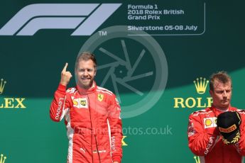 World © Octane Photographic Ltd. Formula 1 – British GP - Podium. Scuderia Ferrari SF71-H – Sebastian Vettel and Kimi Raikkonen. Silverstone Circuit, Towcester, UK. Sunday 8th July 2018.