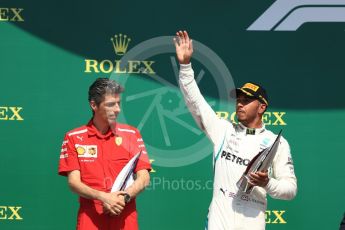 World © Octane Photographic Ltd. Formula 1 – British GP - Podium. Mercedes AMG Petronas Motorsport AMG F1 W09 EQ Power+ - Lewis Hamilton with Scuderia Ferrari's Claudio Albertini. Silverstone Circuit, Towcester, UK. Sunday 8th July 2018.