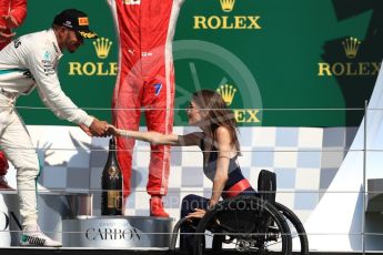 World © Octane Photographic Ltd. Formula 1 – British GP - Podium. Mercedes AMG Petronas Motorsport AMG F1 W09 EQ Power+ - Lewis Hamilton and Nathalie McGloin - President of the FIA Disability and Accessibility Commission. Silverstone Circuit, Towcester, UK. Sunday 8th July 2018.