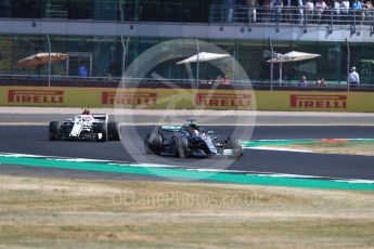 World © Octane Photographic Ltd. Formula 1 – British GP - Practice 1. Mercedes AMG Petronas Motorsport AMG F1 W09 EQ Power+ - Lewis Hamilton and Alfa Romeo Sauber F1 Team C37 – Charles Leclerc. Silverstone Circuit, Towcester, UK. Friday 6th July 2018.