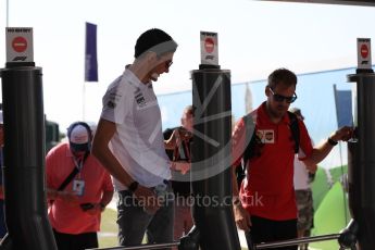 World © Octane Photographic Ltd. Formula 1 – British GP - Paddock. Sahara Force India VJM11 - Esteban Ocon and Scuderia Ferrari SF71-H – Sebastian Vettel. Silverstone Circuit, Towcester, UK. Sunday 8th July 2018.