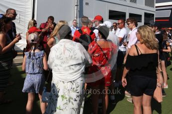 World © Octane Photographic Ltd. Formula 1 – British GP - Paddock. Scuderia Ferrari SF71-H – Sebastian Vettel with fans. Silverstone Circuit, Towcester, UK. Sunday 8th July 2018.