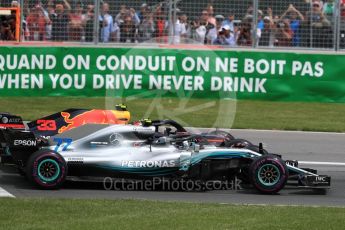 World © Octane Photographic Ltd. Formula 1 – Canadian GP - Race. Mercedes AMG Petronas Motorsport AMG F1 W09 EQ Power+ - Valtteri Bottas and Aston Martin Red Bull Racing TAG Heuer RB14 – Max Verstappen. Circuit Gilles Villeneuve, Montreal, Canada. Sunday 10th June 2018.