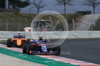 World © Octane Photographic Ltd. Formula 1 – Winter Test 1. Scuderia Toro Rosso STR13 – Brendon Hartley and McLaren MCL33 – Fernando Alonso. Circuit de Barcelona-Catalunya, Spain. Monday 26th February 2018.