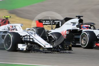 World © Octane Photographic Ltd. Formula 1 – German GP - Practice 2. Alfa Romeo Sauber F1 Team C37 – Charles Leclerc and Haas F1 Team VF-18 – Romain Grosjean. Hockenheimring, Baden-Wurttemberg, Germany. Friday 20th July 2018.