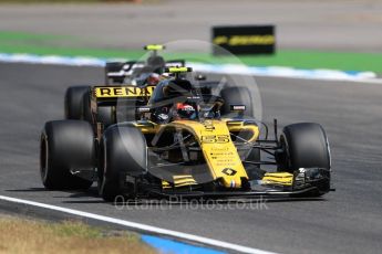 World © Octane Photographic Ltd. Formula 1 – German GP - Practice 2. Renault Sport F1 Team RS18 – Carlos Sainz and Haas F1 Team VF-18 – Kevin Magnussen. Hockenheimring, Baden-Wurttemberg, Germany. Friday 20th July 2018.