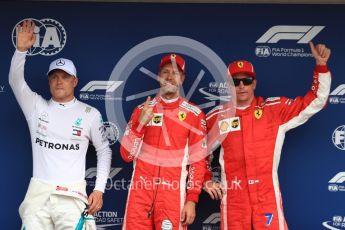 World © Octane Photographic Ltd. Formula 1 – German GP - Qualifying. Scuderia Ferrari SF71-H – Sebastian Vettel (Pole) and Kimi Raikkonen (3rd) with Mercedes AMG Petronas Motorsport AMG F1 W09 EQ Power+ - Valtteri Bottas (2nd). Hockenheimring, Baden-Wurttemberg, Germany. Saturday 21st July 2018.