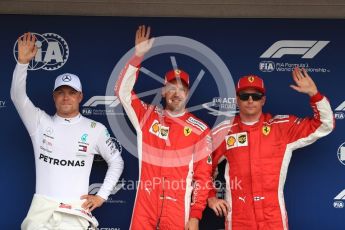 World © Octane Photographic Ltd. Formula 1 – German GP - Qualifying. Scuderia Ferrari SF71-H – Sebastian Vettel (Pole) and Kimi Raikkonen (3rd) with Mercedes AMG Petronas Motorsport AMG F1 W09 EQ Power+ - Valtteri Bottas (2nd). Hockenheimring, Baden-Wurttemberg, Germany. Saturday 21st July 2018.