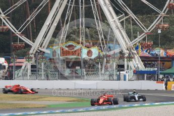 World © Octane Photographic Ltd. Formula 1 – German GP - Race. Scuderia Ferrari SF71-H – Sebastian Vettel leads Mercedes AMG Petronas Motorsport AMG F1 W09 EQ Power+ - Valtteri Bottas and team mate Kimi Raikkonen. Hockenheimring, Baden-Wurttemberg, Germany. Sunday 22nd July 2018.