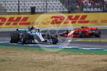 World © Octane Photographic Ltd. Formula 1 – German GP - Race. Mercedes AMG Petronas Motorsport AMG F1 W09 EQ Power+ - Valtteri Bottas and Scuderia Ferrari SF71-H – Kimi Raikkonen. Hockenheimring, Baden-Wurttemberg, Germany. Sunday 22nd July 2018.