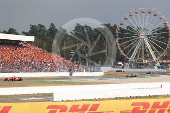 World © Octane Photographic Ltd. Formula 1 – German GP - Race. Scuderia Ferrari SF71-H – Sebastian Vettel leads Mercedes AMG Petronas Motorsport AMG F1 W09 EQ Power+ - Valtteri Bottas, team mate Kimi Raikkonen and Aston Martin Red Bull Racing TAG Heuer RB14 – Max Verstappen. Hockenheimring, Baden-Wurttemberg, Germany. Sunday 22nd July 2018.