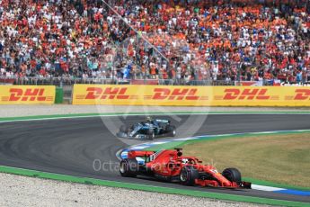 World © Octane Photographic Ltd. Formula 1 – German GP - Race. Scuderia Ferrari SF71-H – Sebastian Vettel leads Mercedes AMG Petronas Motorsport AMG F1 W09 EQ Power+ - Valtteri Bottas. Hockenheimring, Baden-Wurttemberg, Germany. Sunday 22nd July 2018.