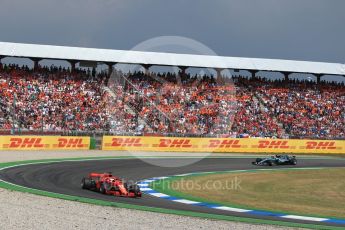 World © Octane Photographic Ltd. Formula 1 – German GP - Race. Scuderia Ferrari SF71-H – Sebastian Vettel leads Mercedes AMG Petronas Motorsport AMG F1 W09 EQ Power+ - Valtteri Bottas. Hockenheimring, Baden-Wurttemberg, Germany. Sunday 22nd July 2018.