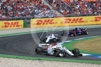 World © Octane Photographic Ltd. Formula 1 – German GP - Race. Alfa Romeo Sauber F1 Team C37 – Marcus Ericsson, Williams Martini Racing FW41 – Lance Stroll snd Scuderia Toro Rosso STR13 – Brendon Hartley. Hockenheimring, Baden-Wurttemberg, Germany. Sunday 22nd July 2018.