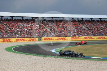 World © Octane Photographic Ltd. Formula 1 – German GP - Race. Mercedes AMG Petronas Motorsport AMG F1 W09 EQ Power+ - Valtteri Bottas and Scuderia Ferrari SF71-H – Kimi Raikkonen. Hockenheimring, Baden-Wurttemberg, Germany. Sunday 22nd July 2018.