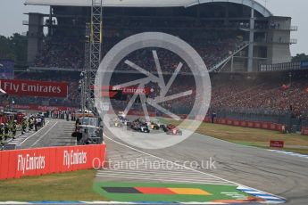 World © Octane Photographic Ltd. Formula 1 – German GP - Race. Race start and Scuderia Ferrari SF71-H – Sebastian Vettel holds the lead. Hockenheimring, Baden-Wurttemberg, Germany. Sunday 22nd July 2018.