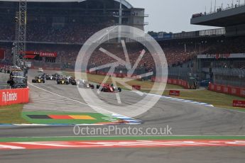 World © Octane Photographic Ltd. Formula 1 – German GP - Race. Race start and Scuderia Ferrari SF71-H – Sebastian Vettel holds the lead. Hockenheimring, Baden-Wurttemberg, Germany. Sunday 22nd July 2018.