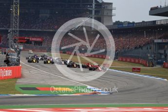 World © Octane Photographic Ltd. Formula 1 – German GP - Race. Race start and Scuderia Ferrari SF71-H – Sebastian Vettel holds the lead. Hockenheimring, Baden-Wurttemberg, Germany. Sunday 22nd July 2018.