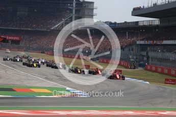 World © Octane Photographic Ltd. Formula 1 – German GP - Race. Race start and Scuderia Ferrari SF71-H – Sebastian Vettel holds the lead. Hockenheimring, Baden-Wurttemberg, Germany. Sunday 22nd July 2018.