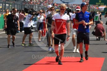 World © Octane Photographic Ltd. Formula 1 – Hungarian GP - Drivers’ Parade. Alfa Romeo Sauber F1 Team C37 – Marcus Ericsson and Scuderia Toro Rosso STR13 – Brendon Hartley. Hungaroring, Budapest, Hungary. Sunday 29th July 2018.
