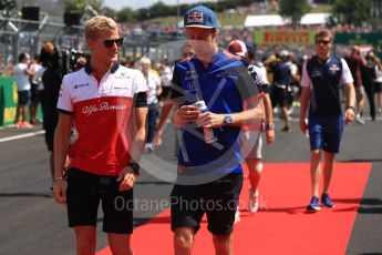 World © Octane Photographic Ltd. Formula 1 – Hungarian GP - Drivers’ Parade. Alfa Romeo Sauber F1 Team C37 – Marcus Ericsson and Scuderia Toro Rosso STR13 – Brendon Hartley. Hungaroring, Budapest, Hungary. Sunday 29th July 2018.