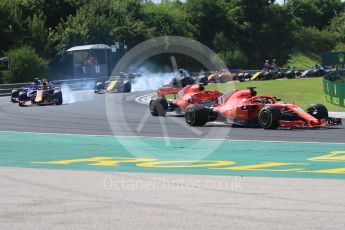 World © Octane Photographic Ltd. Formula 1 – Hungarian GP - Race. Scuderia Ferrari SF71-H – Sebastian Vettel while Aston Martin Red Bull Racing TAG Heuer RB14 – Max Verstappen locks a brake behind. Hungaroring, Budapest, Hungary. Sunday 29th July 2018.