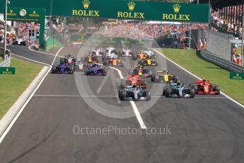 World © Octane Photographic Ltd. Formula 1 – Hungarian GP - Race. Mercedes AMG Petronas Motorsport AMG F1 W09 EQ Power+ - Lewis Hamilton leads the pack into Turn 1. Hungaroring, Budapest, Hungary. Sunday 29th July 2018.