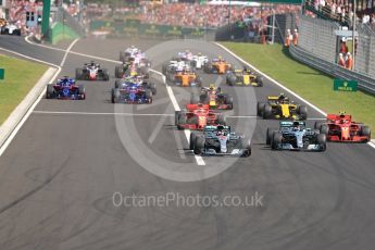 World © Octane Photographic Ltd. Formula 1 – Hungarian GP - Race. Mercedes AMG Petronas Motorsport AMG F1 W09 EQ Power+ - Lewis Hamilton leads the pack into Turn 1. Hungaroring, Budapest, Hungary. Sunday 29th July 2018.