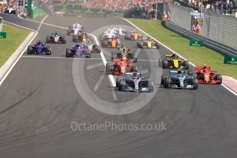 World © Octane Photographic Ltd. Formula 1 – Hungarian GP - Race. Mercedes AMG Petronas Motorsport AMG F1 W09 EQ Power+ - Lewis Hamilton leads the pack into Turn 1. Hungaroring, Budapest, Hungary. Sunday 29th July 2018.