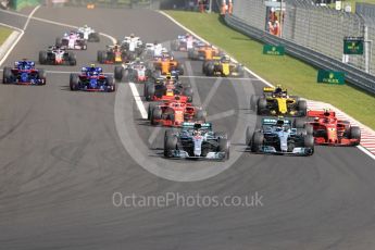 World © Octane Photographic Ltd. Formula 1 – Hungarian GP - Race. Mercedes AMG Petronas Motorsport AMG F1 W09 EQ Power+ - Lewis Hamilton leads the pack into Turn 1. Hungaroring, Budapest, Hungary. Sunday 29th July 2018.