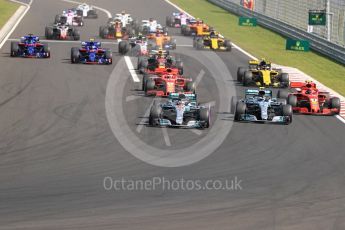 World © Octane Photographic Ltd. Formula 1 – Hungarian GP - Race. Mercedes AMG Petronas Motorsport AMG F1 W09 EQ Power+ - Lewis Hamilton leads the pack into Turn 1. Hungaroring, Budapest, Hungary. Sunday 29th July 2018.