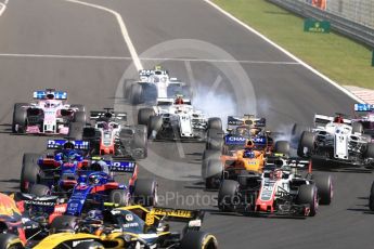 World © Octane Photographic Ltd. Formula 1 – Hungarian GP - Race. Alfa Romeo Sauber F1 Team C37 – Charles Leclerc locks a brake while Marcus Ericsson gets launched . Hungaroring, Budapest, Hungary. Sunday 29th July 2018.