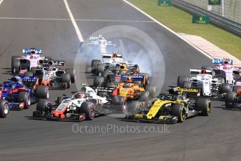 World © Octane Photographic Ltd. Formula 1 – Hungarian GP - Race. Alfa Romeo Sauber F1 Team C37 – Charles Leclerc locks a brake while Marcus Ericsson gets launched . Hungaroring, Budapest, Hungary. Sunday 29th July 2018.
