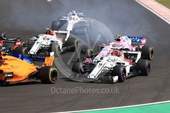 World © Octane Photographic Ltd. Formula 1 – Hungarian GP - Race. Alfa Romeo Sauber F1 Team C37 – Marcus Ericsson and Sahara Force India VJM11 - Esteban Ocon. Hungaroring, Budapest, Hungary. Sunday 29th July 2018.