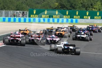 World © Octane Photographic Ltd. Formula 1 – Hungarian GP - Race. Williams Martini Racing FW41 – Sergey Sirotkin and the rest of the grid make it around Turn 1. Hungaroring, Budapest, Hungary. Sunday 29th July 2018.