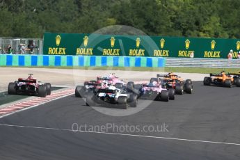 World © Octane Photographic Ltd. Formula 1 – Hungarian GP - Race. Williams Martini Racing FW41 – Sergey Sirotkin and the rest of the grid make it around Turn 1. Hungaroring, Budapest, Hungary. Sunday 29th July 2018.