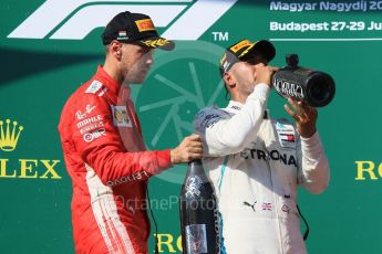 World © Octane Photographic Ltd. Formula 1 – Hungarian GP - Podium. Mercedes AMG Petronas Motorsport AMG F1 W09 EQ Power+ - Lewis Hamilton and Scuderia Ferrari SF71-H – Sebastian Vettel. Hungaroring, Budapest, Hungary. Sunday 29th July 2018.