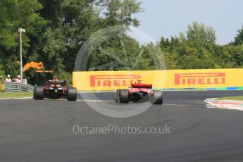 World © Octane Photographic Ltd. Formula 1 – Hungarian GP - Practice 1. Aston Martin Red Bull Racing TAG Heuer RB14 – Max Verstappen and Scuderia Ferrari SF71-H – Kimi Raikkonen. Hungaroring, Budapest, Hungary. Friday 27th July 2018.