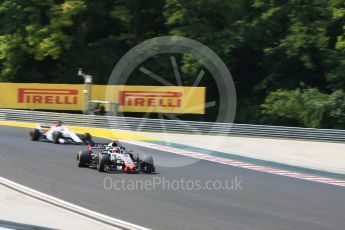 World © Octane Photographic Ltd. Formula 1 – Hungarian GP - Practice 1. Haas F1 Team VF-18 – Kevin Magnussen and Alfa Romeo Sauber F1 Team C37 – Marcus Ericsson. Hungaroring, Budapest, Hungary. Friday 27th July 2018.