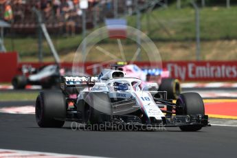 World © Octane Photographic Ltd. Formula 1 – Hungarian GP - Practice 1. Williams Martini Racing FW41 – Lance Stroll, Sahara Force India VJM11 - Esteban Ocon and Haas F1 Team VF-18 – Romain Grosjean. Hungaroring, Budapest, Hungary. Friday 27th July 2018.
