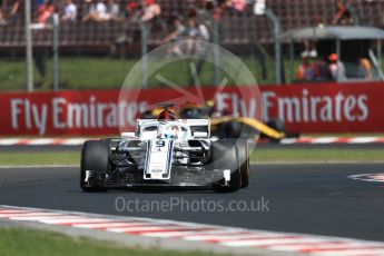 World © Octane Photographic Ltd. Formula 1 – Hungarian GP - Practice 1. Alfa Romeo Sauber F1 Team C37 – Marcus Ericsson and Renault Sport F1 Team RS18 – Carlos Sainz. Hungaroring, Budapest, Hungary. Friday 27th July 2018.